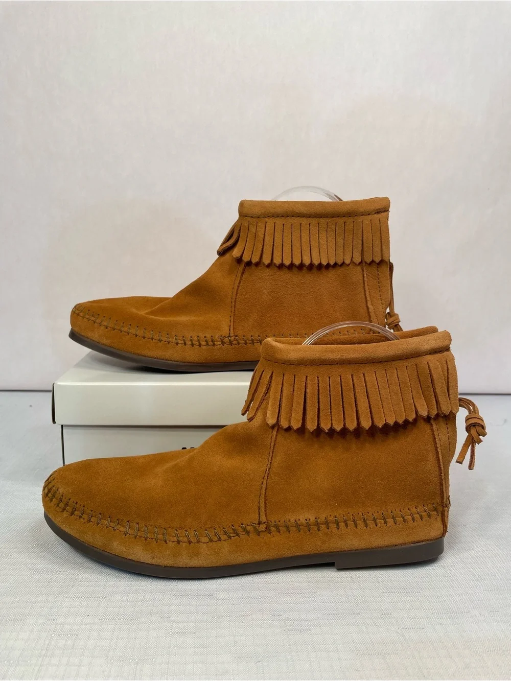 Minnetonka Suede Women’s Fringe Back Zip Ankle Boots in Brown